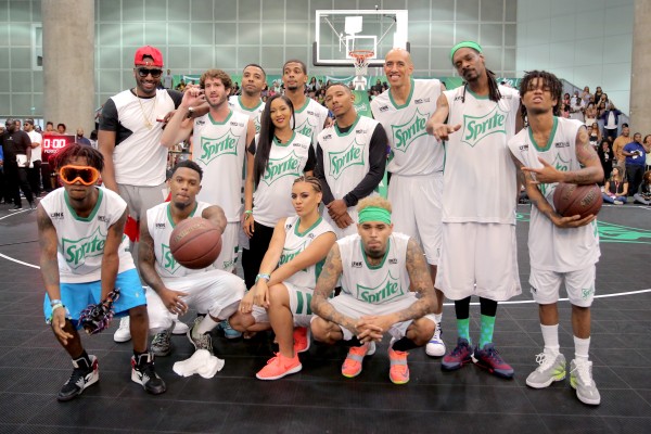 LOS ANGELES, CA - JUNE 27:  (Back Row L-R) NBA player John Wall, rapper Lil Dicky, actor Christian Keyes, Harlem Globetrotter Tammy T-Time, professional dunker Guy Dupuy, actor Allen Maldonado, former NBA player Guy Christie, rapper Snoop Dogg, recording artist Khalif 'Swae Lee' Brown, (Front Row L-R) Aaquil 'Slim Jimmy' Brown, former NBA player Daniel 'Boobie' Gibson, Dinah Jane Hansen of the music group 'Fifth Harmony', and singer Chris Brown pose during the Sprite celebrity basketball game during the 2015 BET Experience at the Los Angeles Convention Center on June 27, 2015 in Los Angeles, California.  (Photo by Chelsea Lauren/BET/Getty Images for BET)