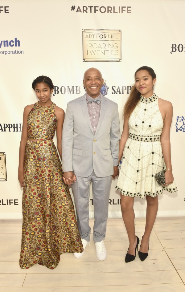 WATER MILL, NY - JULY 18:  Russell Simmons and his daughters Aoki Lee and Ming Lee arrive asRUSH Philanthropic Arts Foundation Celebrates 20th Anniversary at Art For Life sponsored by Bombay Sapphire Gin at Fairview Farms on July 18, 2015 in Water Mill, New York.  (Photo by Eugene Gologursky/Getty Images for Bombay Sapphire Gin)