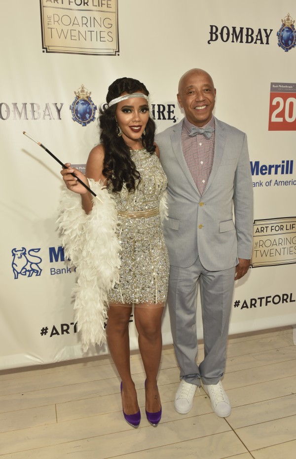 WATER MILL, NY - JULY 18:  Angela Simmons and Russell Simmons attend as RUSH Philanthropic Arts Foundation Celebrates 20th Anniversary at Art For Life sponsored by Bombay Sapphire Gin at Fairview Farms on July 18, 2015 in Water Mill, New York.  (Photo by Eugene Gologursky/Getty Images for Bombay Sapphire Gin)