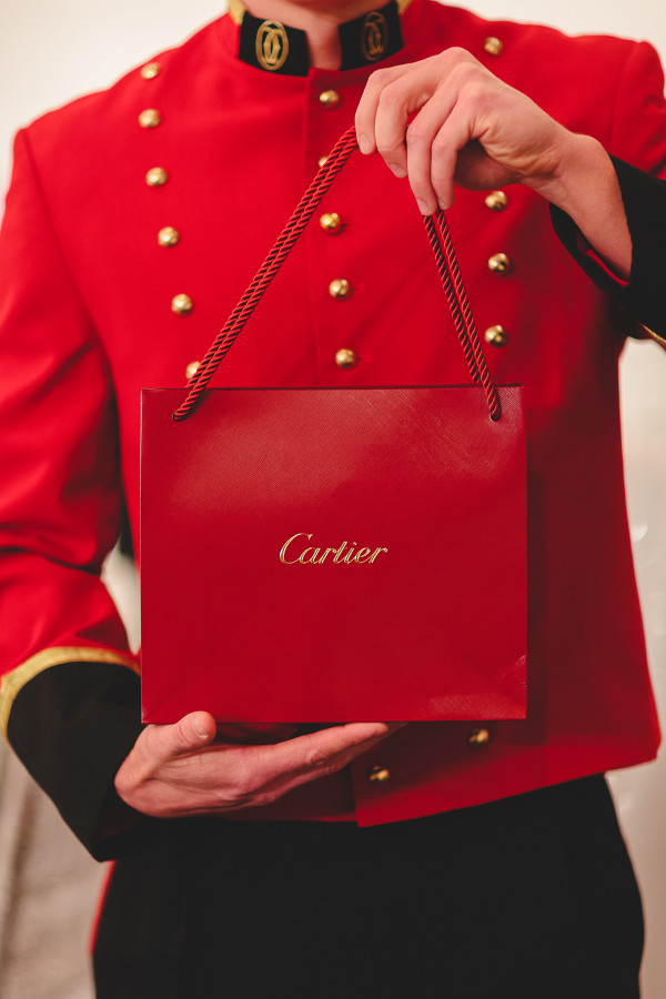 Cartier Bellboy Hands Out Gratis Bags