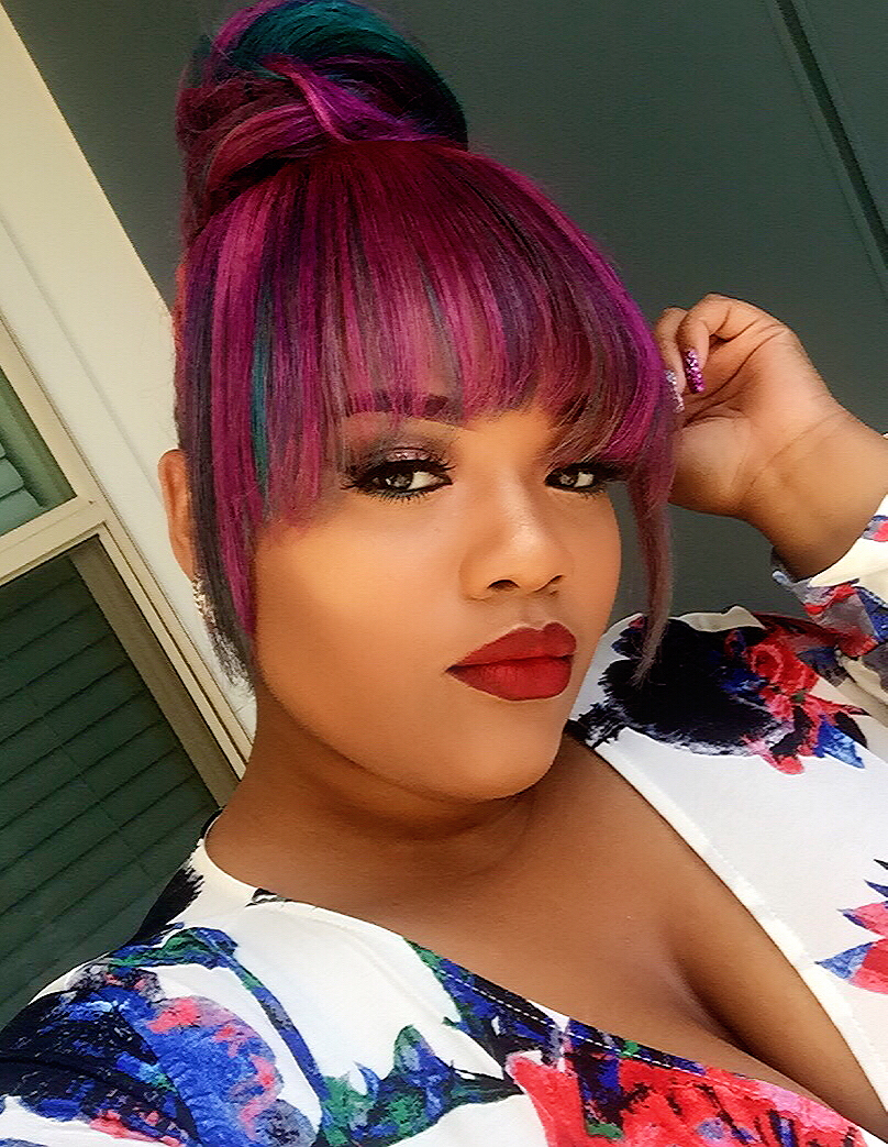 Dootie Rocks A Colorful ‘Top Knot’ With Bangs