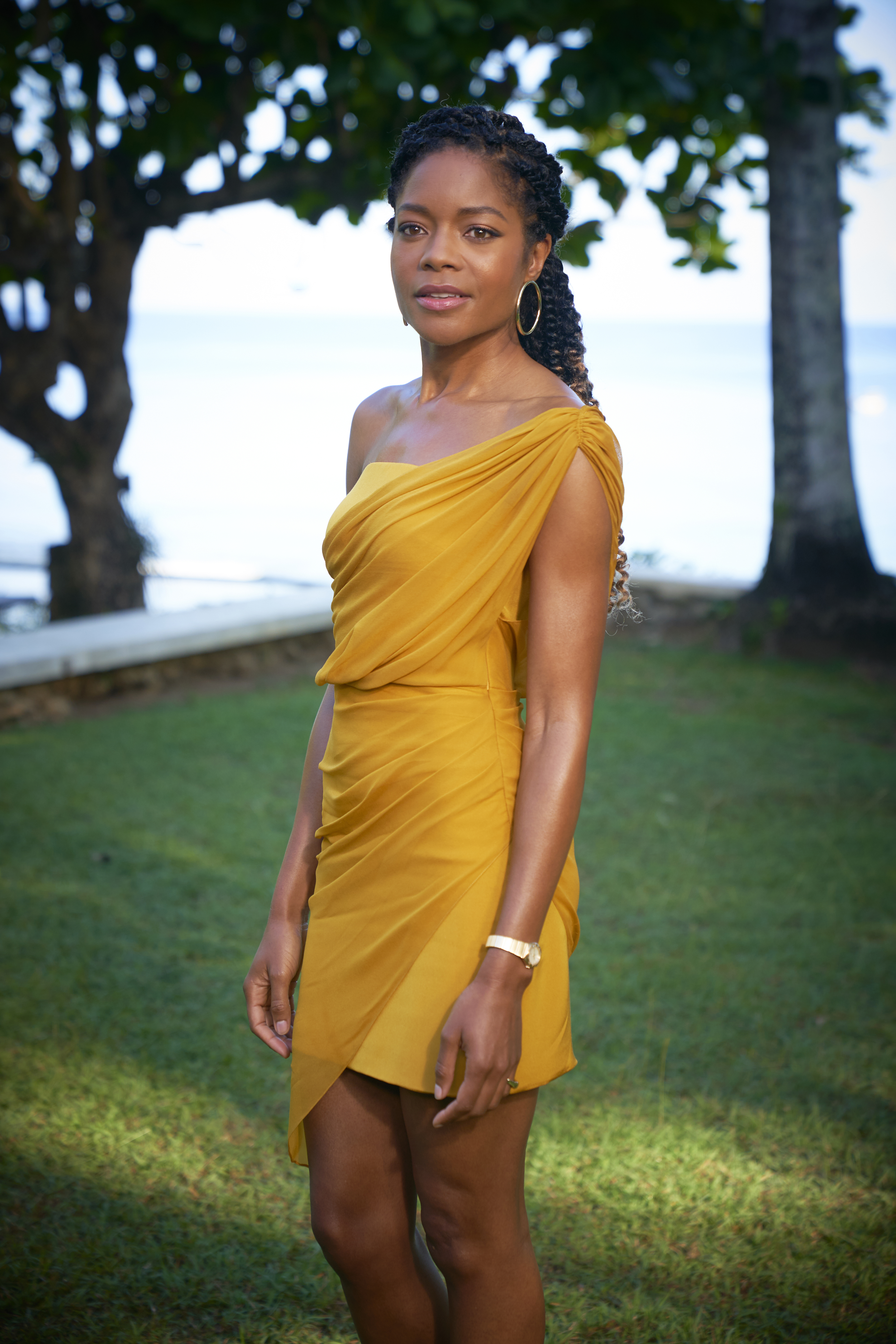 Wardrobe Breakdown: Naomie Harris In Jamaica At Bond 25 Press Junket